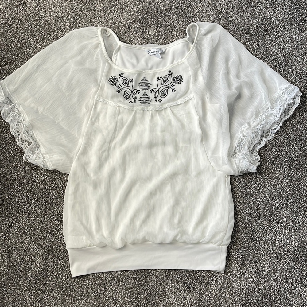 Sheer white blouse with lace